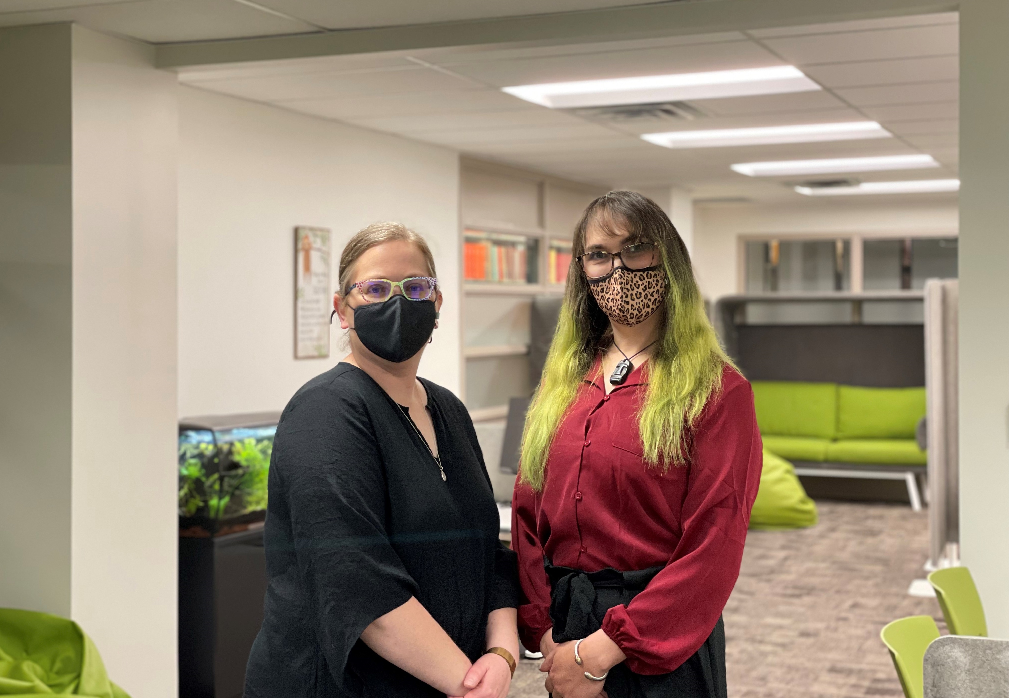 Nancy Waite, coordinator at Library Accessibility Services and Paige Maylott, library accessibility assistant, posing together in the renovated CATS.