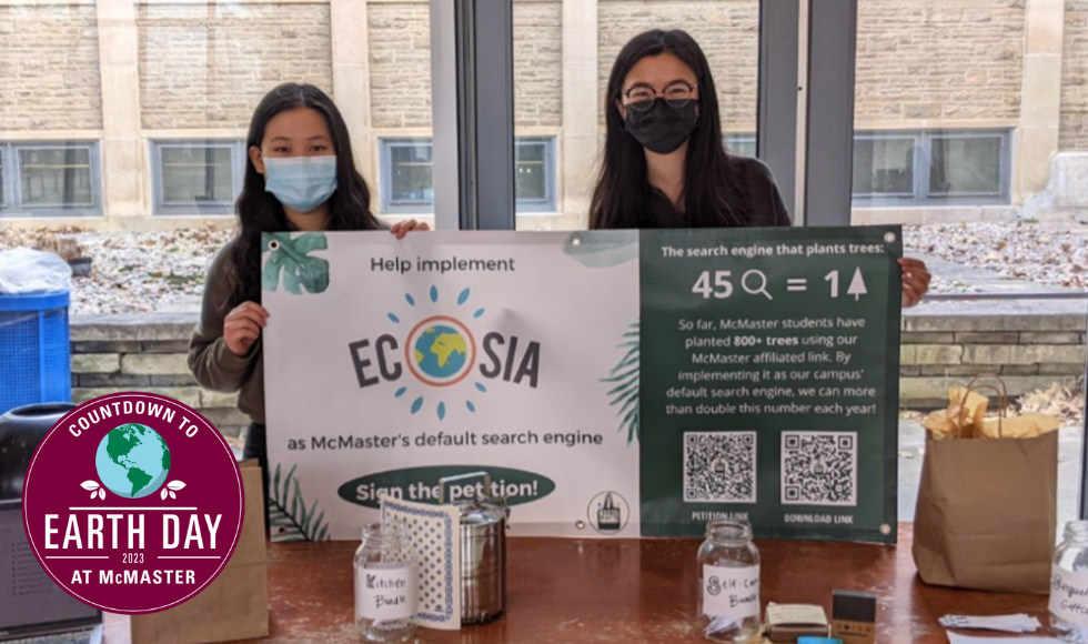 Zero Waste McMaster executive members Paris Liu and Keyra Kam promoting Ecosia at an event in 2022 can be seen.