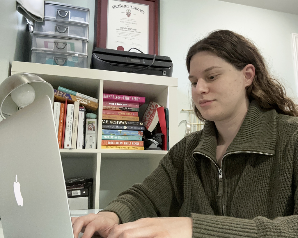  Katie Sonier, research assistant with the Digital Research Commons Pilot, works at her desk from home. Photo by Katie Sonier