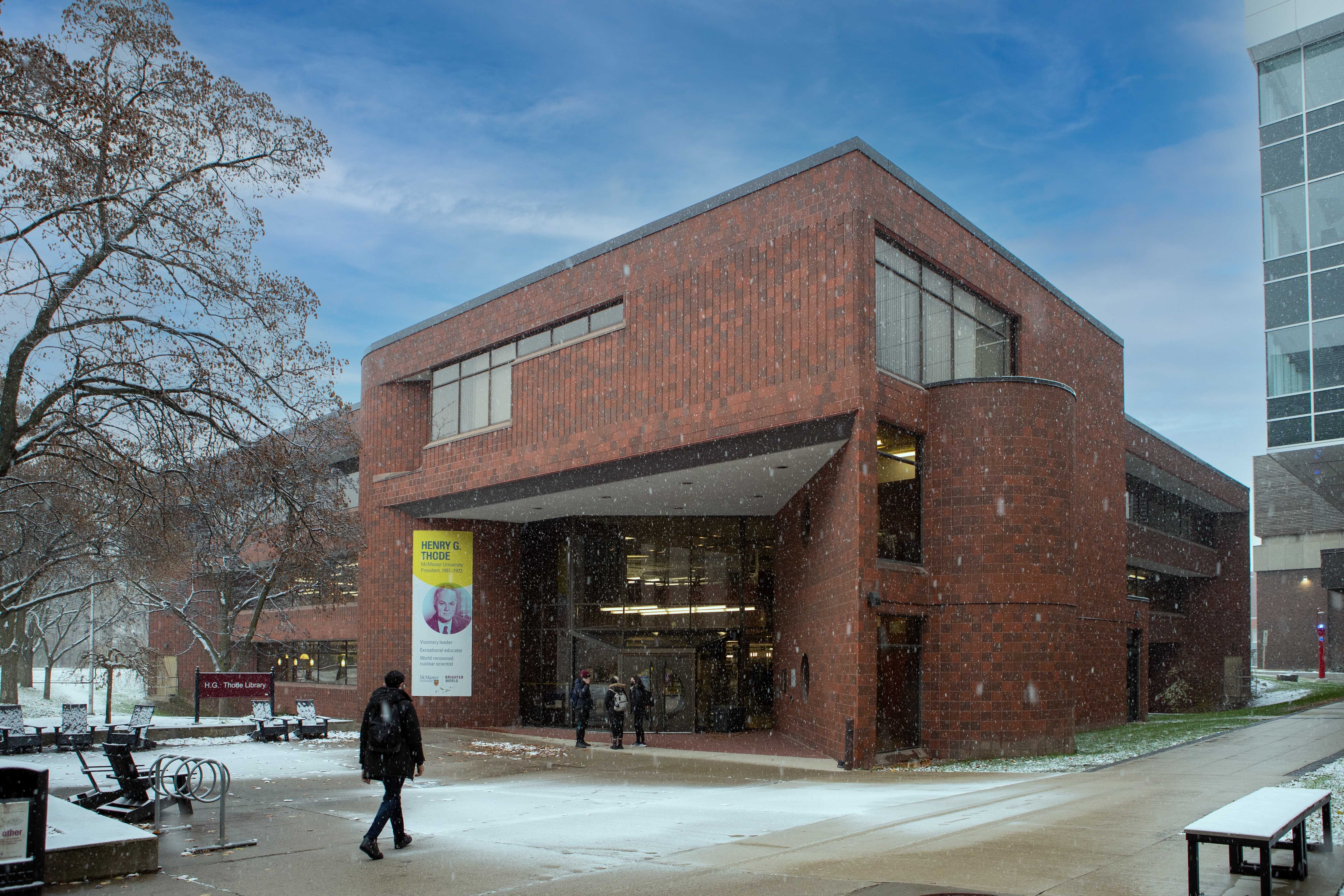 Exterior of Thode library during winter can be seen.