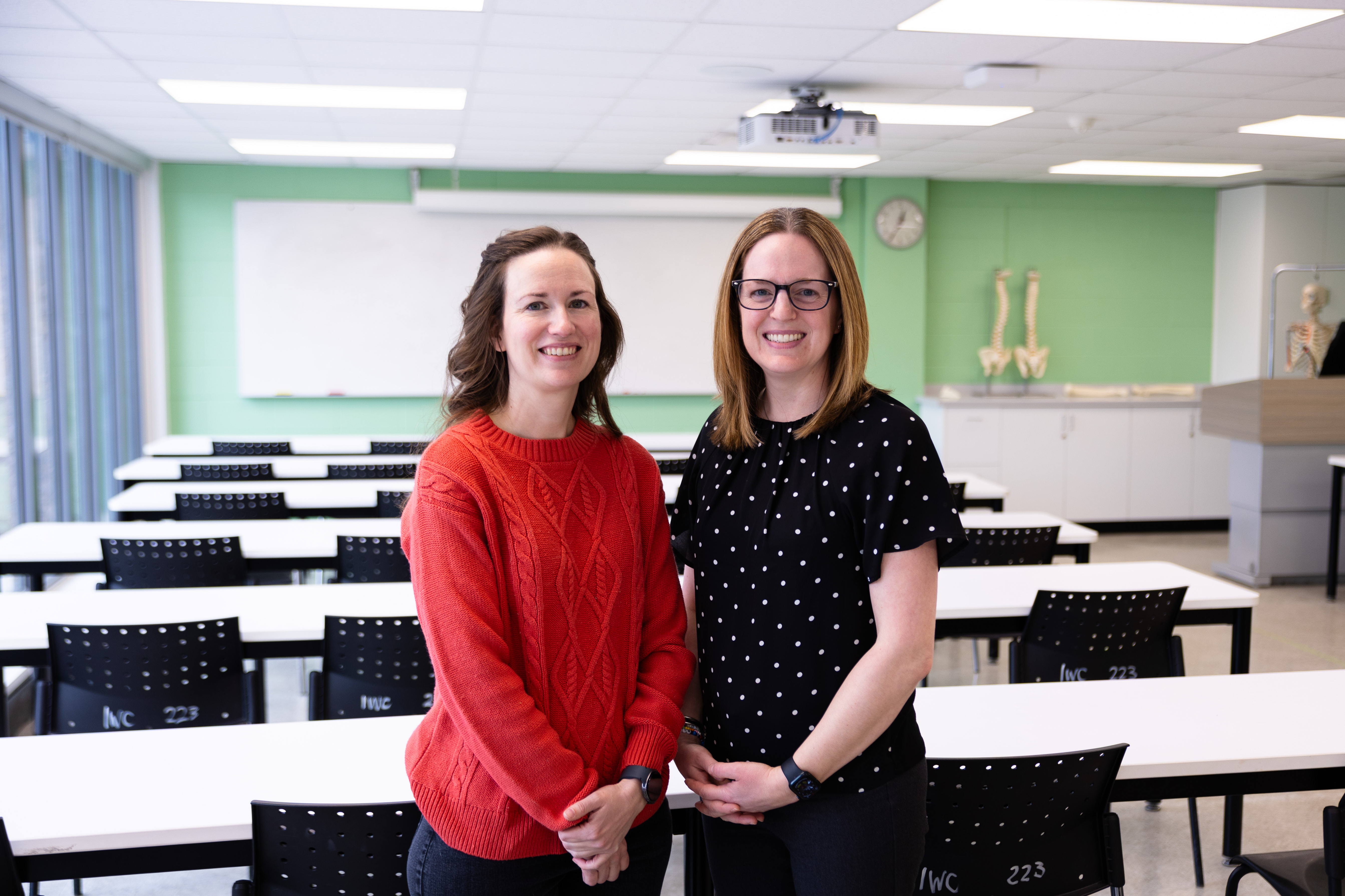 Stephanie Sanger, left, education and curriculum planning librarian, and Anastasia Newman, assistant professor, in a classroom at McMaster University.
