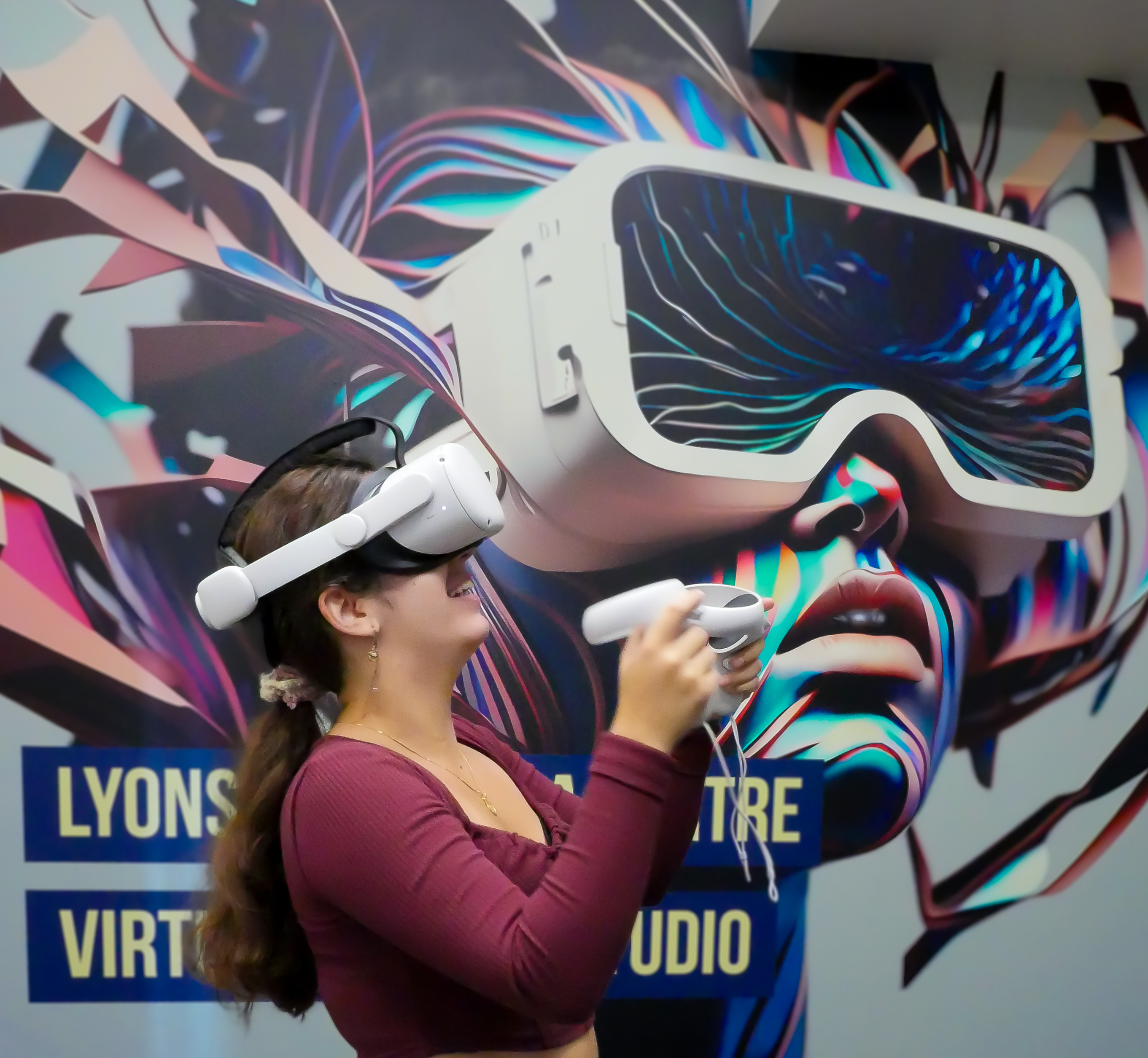 A young woman tries out the virtual reality experience in Lyons New Media Centre.