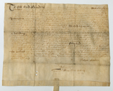 Handwritten vellum document with seal tag at bottom