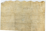 Verso of handwritten vellum document with scalloped edge at top (not visible in first image)