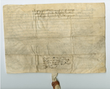 Handwritten vellum document with seal