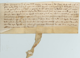 Handwritten vellum document with seal tag