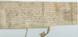 Handwritten vellum document with seal tags