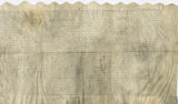Verso of vellum document with scalloped top edge