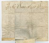Handwritten vellum document with "In the Name of God" written in large lettering at top