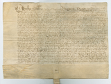 Handwritten vellum document with seal tag just visible at bottom