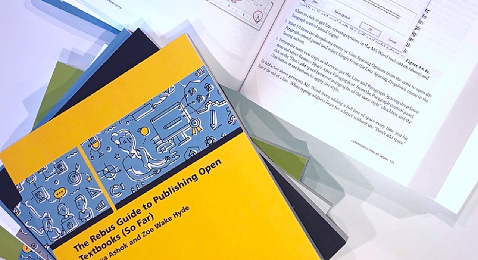 Image of textbooks and open book pages
