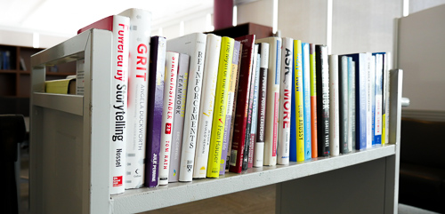 cart with lending library books displayed